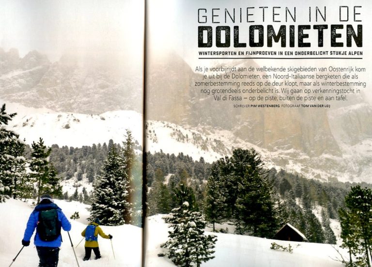 Skiing in the snow in the Dolomite mountains in Italy by Tom van der Leij